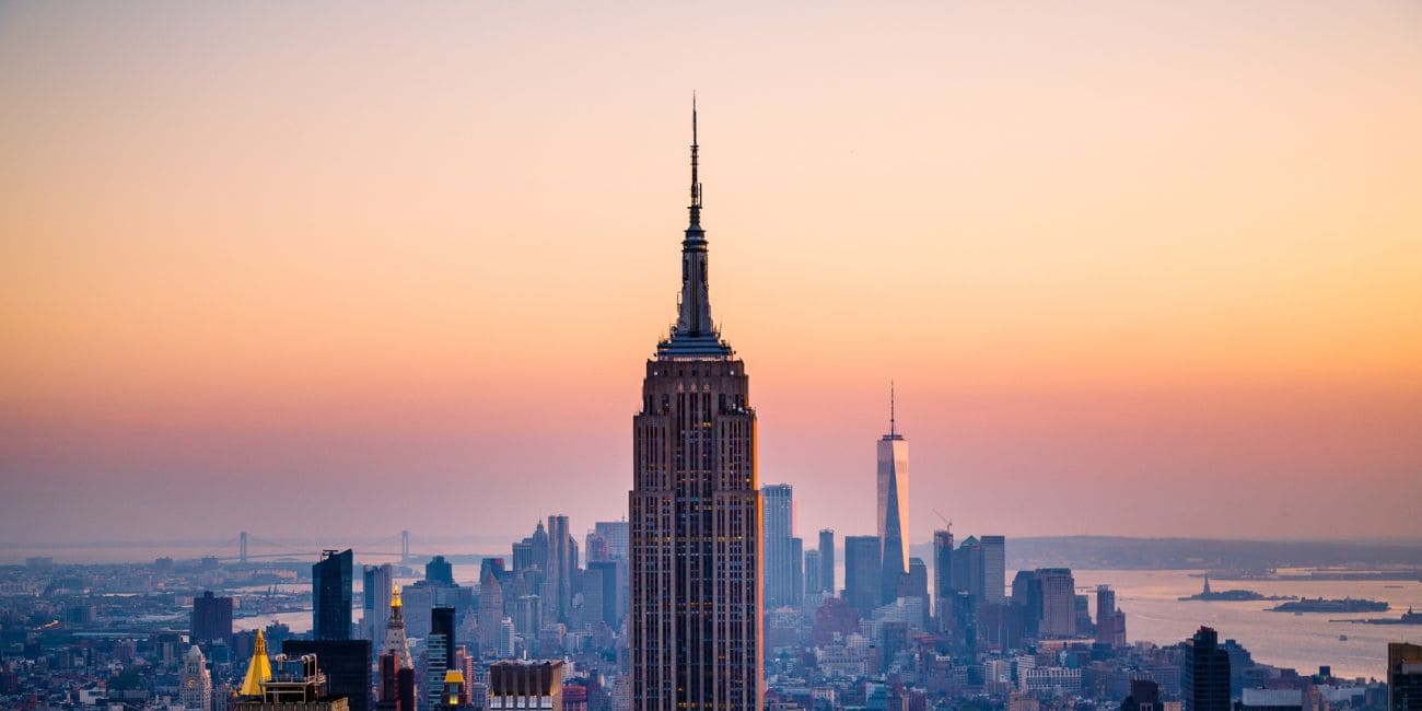 View of the Empire State Building and the New York skyline at sunset